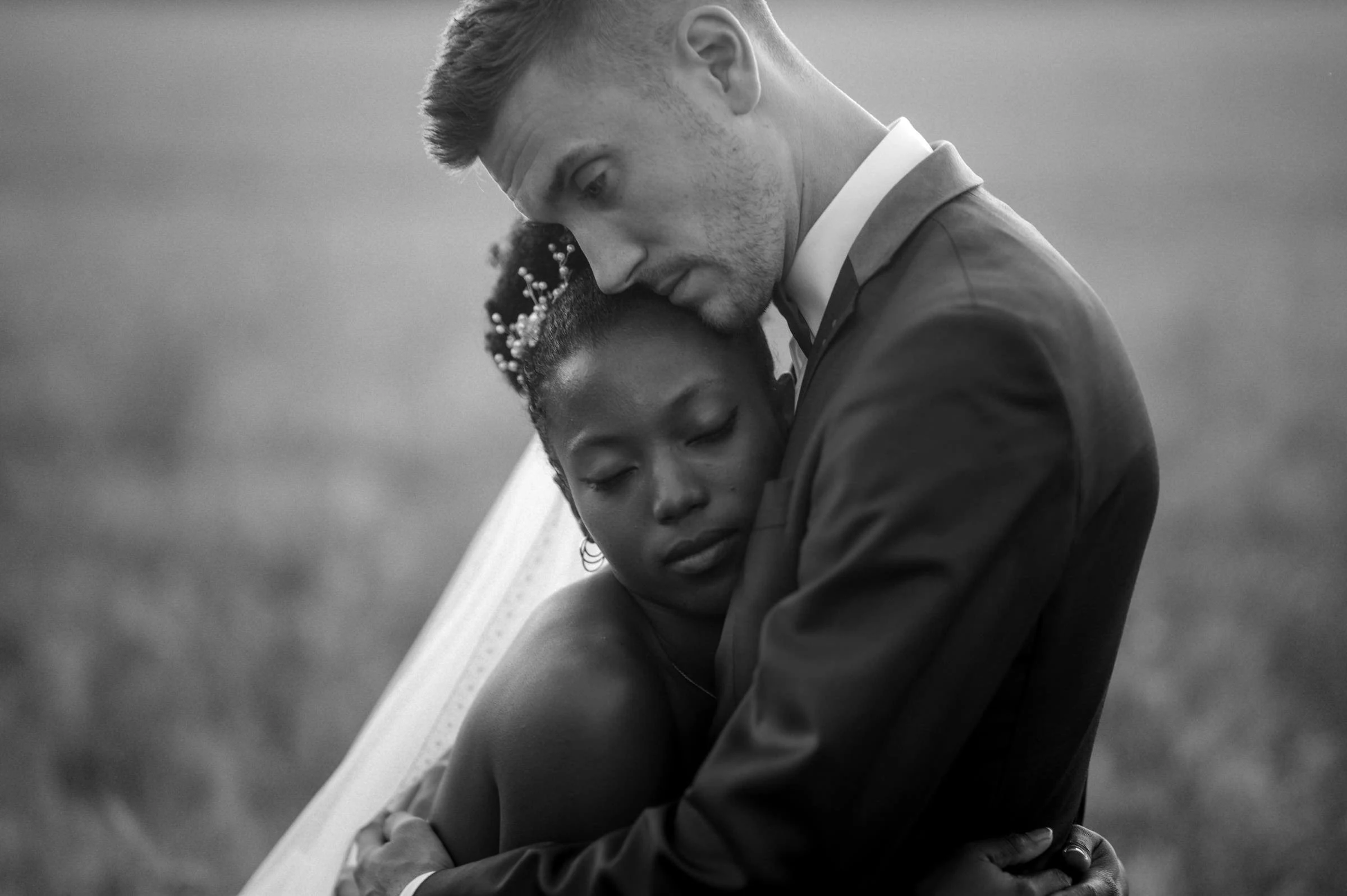 The couple embracing, black and white